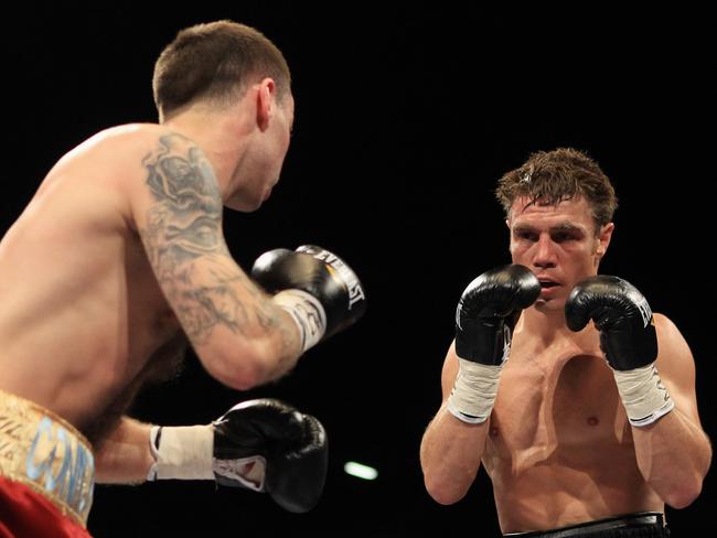 LONDON, ENGLAND - MAY 15:  Kevin Mitchell of England fights Michael Katsidis of Australia, black trunks  fight for the The Interim WBO Lightweight Championship of the World at Boleyn Ground on May 15, 2010 in London, England.  (Photo by Warren Little/Getty Images)