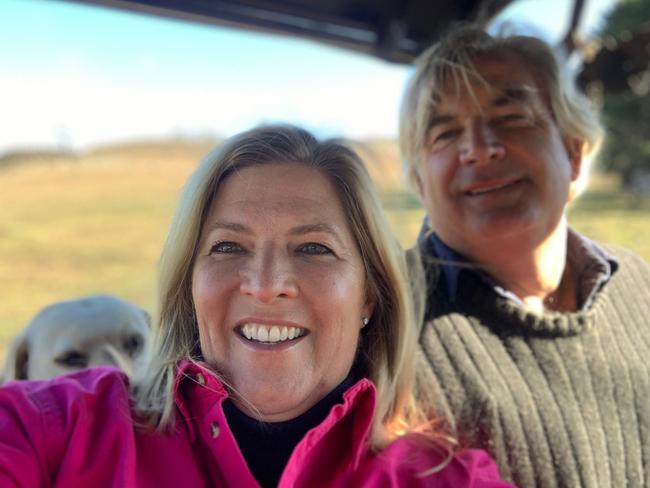 Mental Health Minister Bronnie Taylor, husband Duncan and Maisy the labrador on their farm in Nimmitabel