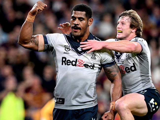 BRISBANE, AUSTRALIA - AUGUST 19: Tui Kamikamica of the Storm celebrates scoring a try during the round 23 NRL match between the Brisbane Broncos and the Melbourne Storm at Suncorp Stadium, on August 19, 2022, in Brisbane, Australia. (Photo by Bradley Kanaris/Getty Images)