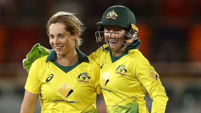 Sophie Molineux celebrates taking a wicket with Alyssa Healy. Picture: CA/Cricket Australia/Getty