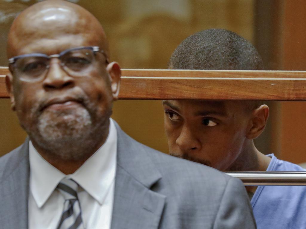 Eric Holder, right, the suspect in the killing of rapper Nipsey Hussle is seen in a Los Angeles court. Picture: AP