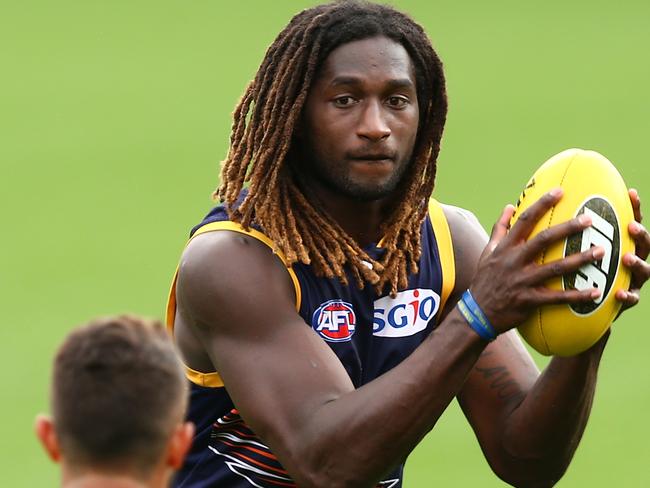 PERTH, AUSTRALIA - SEPTEMBER 11:  Nic Naitanui works on works on a handball drill during a West Coast Eagles AFL training session at Domain Stadium on September 11, 2017 in Perth, Australia.  (Photo by Paul Kane/Getty Images)