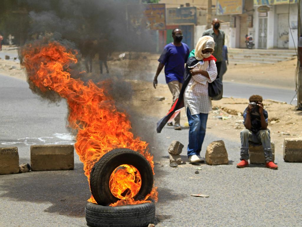 At least seven Sudanese demonstrators were killed as security forces sought to quash mass rallies of protesters demanding an end to military rule.