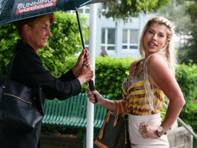 Topless waitress Nateesha Barlin striking a pose outside court.