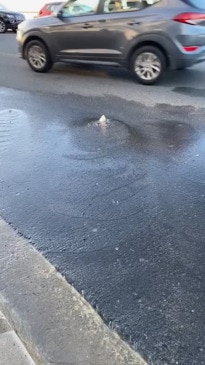 Water bubbling out of a road in Maroubra