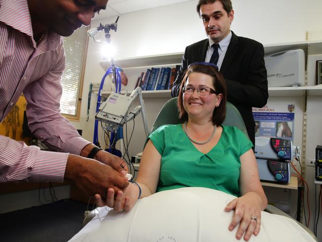 Jodie Bell 32 from Newcastle receiving treatment from Associate Professor Steve Vucic at Westmead Hospital.