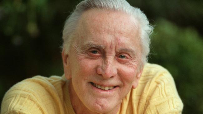 Actor Kirk Douglas relaxes at his home in Beverly Hills, California, in 1999.