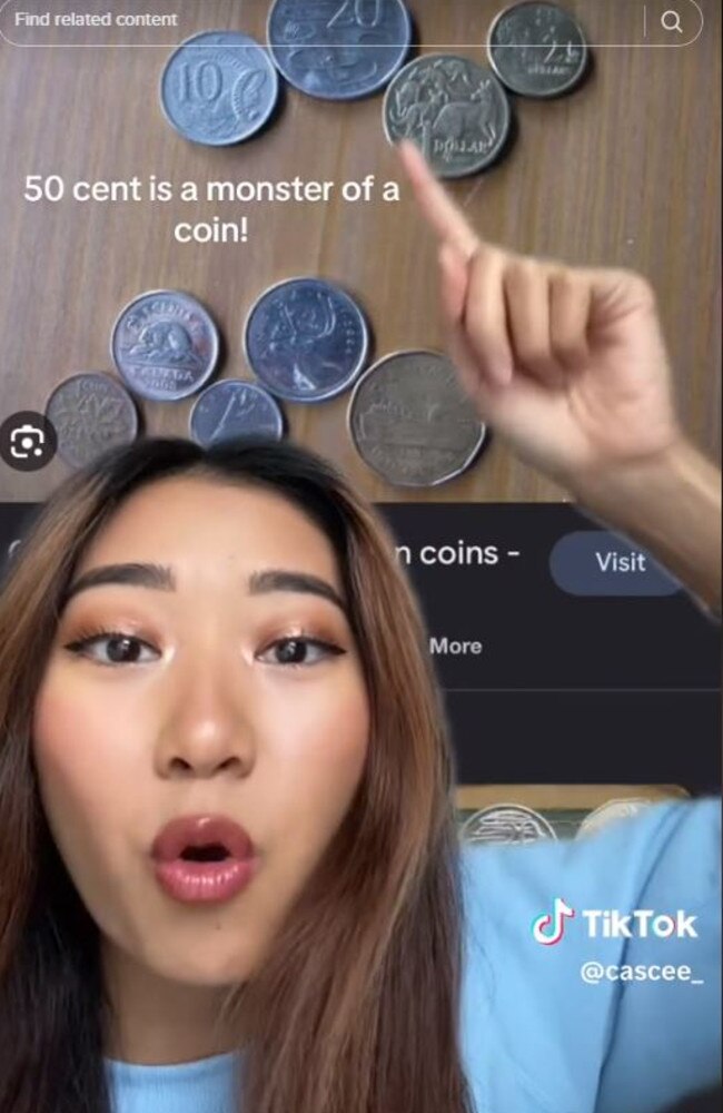 Cassie was surprised at the ‘monster’ size of the 50 cent coin. Picture: TikTok/cascee_