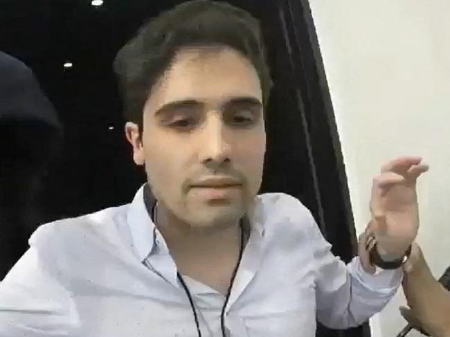 (FILES) This file screenshot dated on October 17, 2019 of a handout video released on October 30, 2019 by the Mexican Government's Production Centre for Informative and Special Programmes (CEPROPIE) shows the moment of the arrest of alleged trafficker Ovidio Guzman, son of jailed drug kingpin Joaquin 