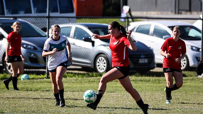 MacKenzie Nielsen controls the ball.