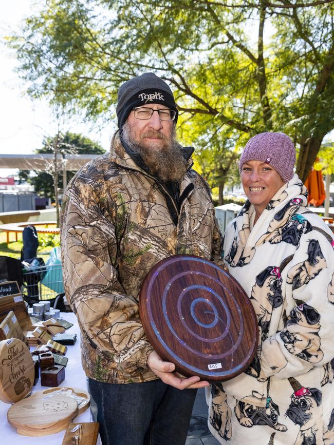 Chinchilla's Paul Varidel and DJ Young at Paul's Wax'n Oil stall at the NAIDOC arts and craft market at Grand Central, Saturday, July 9, 2022. Picture: Kevin Farmer