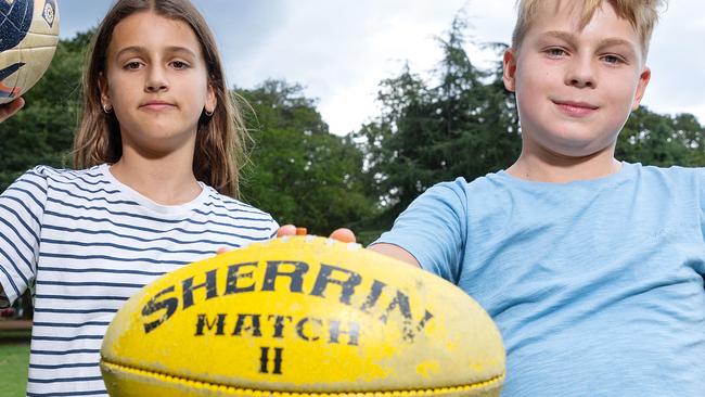 MELBOURNE, MARCH 19, 2024: Harriett Dabbs, 10, and Callum Wilson, 11, are sports mad. Picture: Mark Stewart