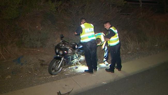 Police at the scene of the fatal motorcycle crash on the Southern Expressway at Reynella. Picture: Nine News