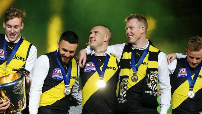 Some happy Tigers celebrating with the Premiership Cup. Picture: Mark Stewart