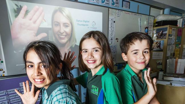 Moreton Downs State School Year 4 students Isabella Erazo, Monique Harris and Aidan Baker taking part in a Kids Helpline video counselling session, now being introduced to schools to help combat cyber bullying. Photo Lachie Millard