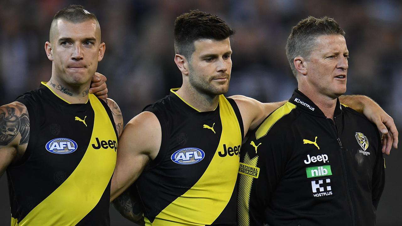 (L-R) Dustin Martin, Trent Cotchin and coach of the Tigers Damien Hardwick are seen before the First Preliminary Final between the Richmond Tigers and the Collingwood Magpies in Week 3 of the AFL Finals Series at the MCG in Melbourne, Friday, September 21, 2018. (AAP Image/Julian Smith) NO ARCHIVING, EDITORIAL USE ONLY