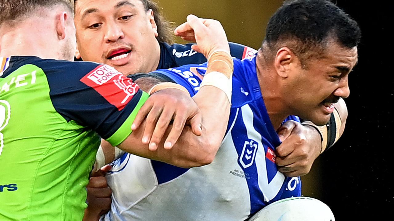 BRISBANE, AUSTRALIA - MAY 15: Ava Seumanufagai of the Bulldogs takes on the defence during the round 10 NRL match between the Canterbury Bulldogs and the Canberra Raiders at Suncorp Stadium, on May 15, 2021, in Brisbane, Australia. (Photo by Bradley Kanaris/Getty Images)