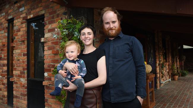 Zoe Birch and Lachlan Gardner with their daughter Quinn at their Hurstbridge restaurant, Greasy Zoe's. Picture: Josie Hayden