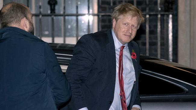 Boris Johnson arrives back at 10 Downing Street after the Commons agrees to hold a December election. Picture: AP.