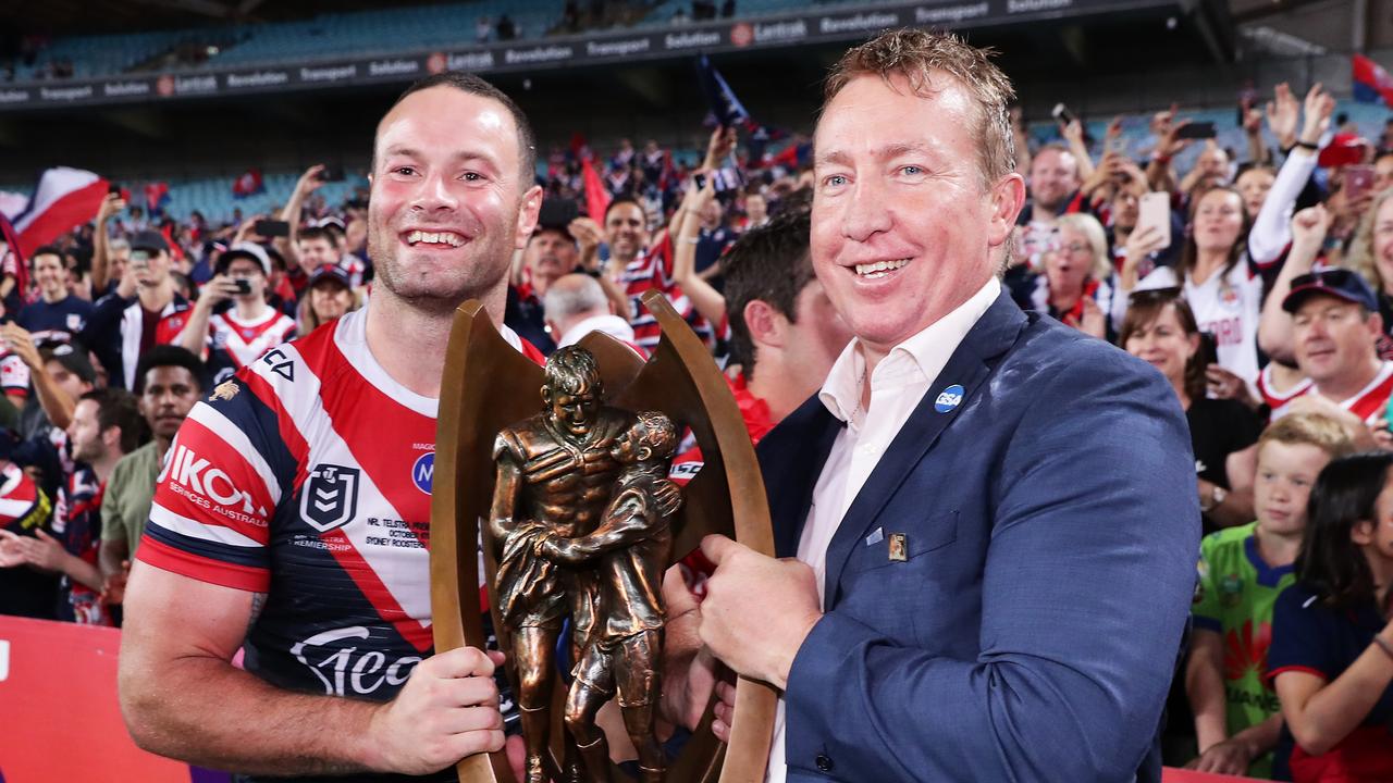 Roosters captain Boyd Cordner and coach Trent Robinson celebrate victory with fans.