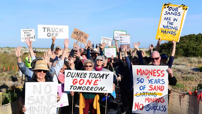 Protesters against sand carting from Semaphore block access to Semaphore Beach. Picture: AAP/Mark Brake