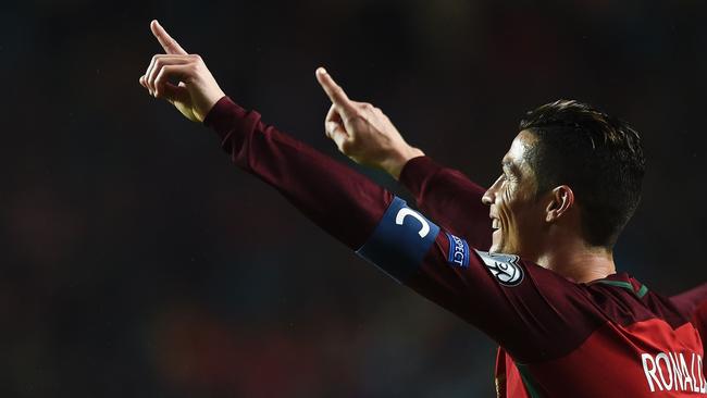 Portugal's forward Cristiano Ronaldo celebrates after scoring .