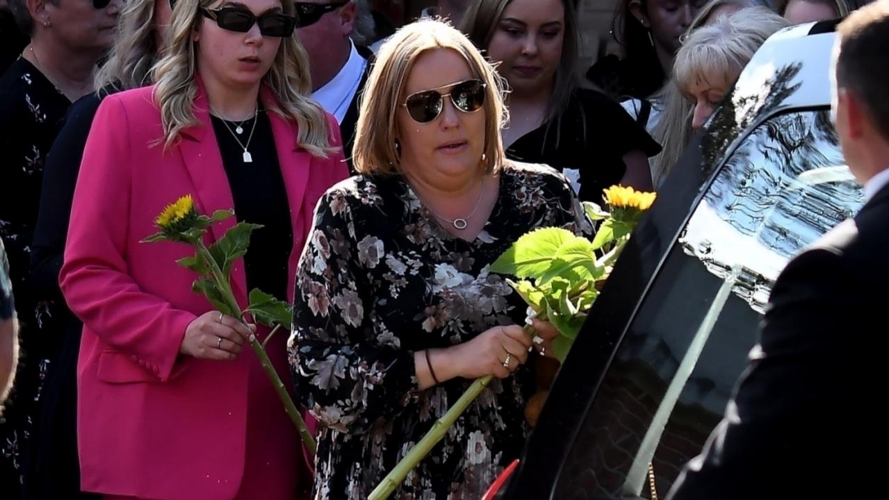 Lily’s mother, Melanie, was seen carrying a sunflower. Picture: Chris Dyson / Backgrid via NCA NewsWire