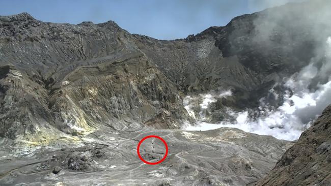 People can be seen inside the crater just before the eruption. Picture: Michael Schade/NZ Herald