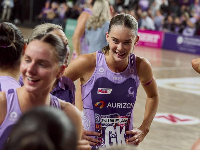 Isabelle Shearer and her Firebirds teammates celebrate their epic win over the West Coast Fever in the Suncorp Super Netball last season.