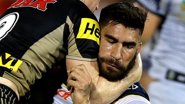 James Tamou wrapped up by the Panthers.