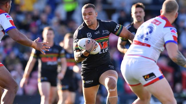 Fisher-Harris tests the Knights defence. Picture: NRL Photos