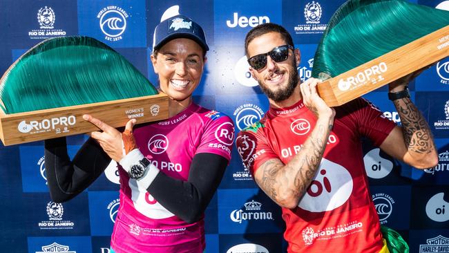 Winners are grinners. Sally Fitzgibbons and Filipe Toledo at the Rio Pro.