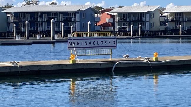 The ‘marina closed’ sign at Couran Cove. Picture: Greg Stolz.