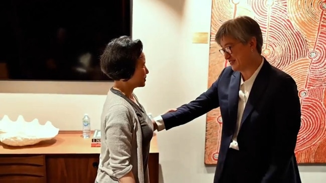 Journalist Cheng Lei greets Penny Wong after being released