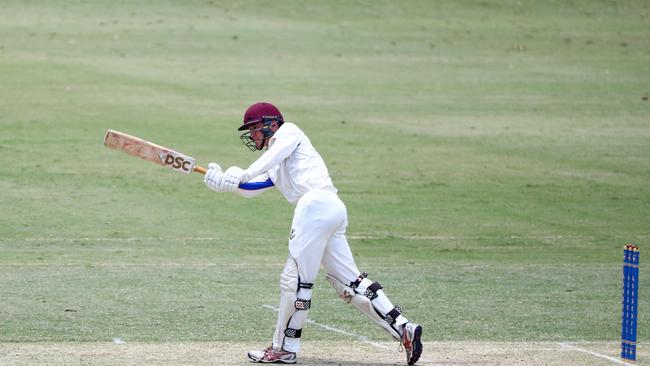 Action during the game between Marist College Ashgrove and St Laurence's. MC's Jessie O'Neal bats. Picture: Tertius Pickard