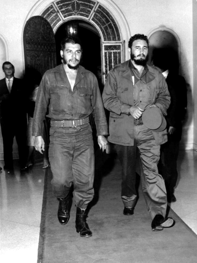 Argentine-born revolutionary figure Ernesto "Che" Guevara with Castro in Havana's famous "1830" restaurant, four years after he and Fidel led the revolution that toppled Cuban dictator Fulgencio Batista.