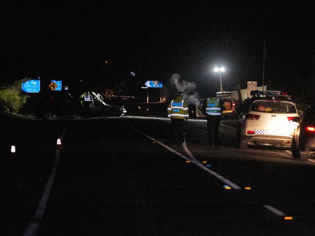 Emergency services at the scene on Monday night, where Dale Wilson was killed in a fiery car crash. Picture: Matt Loxton