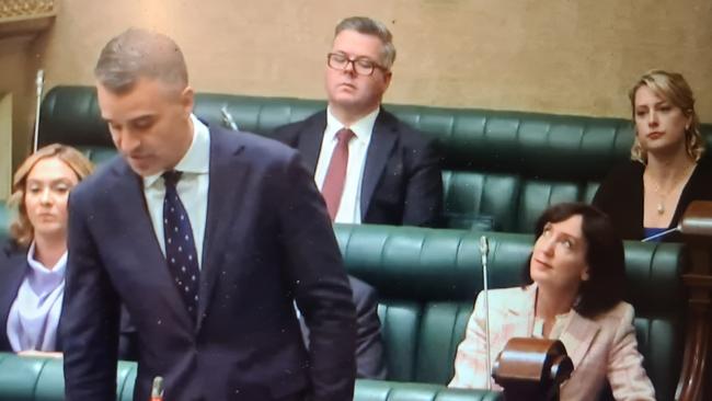 Deputy Premier Susan Close takes a seat behind Premier Peter Malinauskas instead of her usual spot beside him.