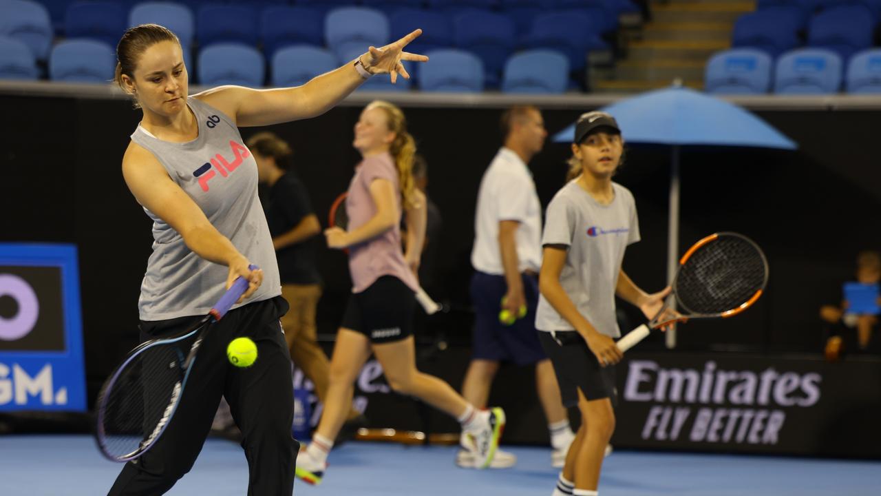 Members of the First Nations ballkid squad were in awe of Ash Barty as she joined them for a hit on Margaret Court Arena on Wednesday morning. Picture: Getty Images