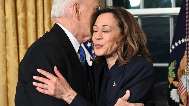 US President Joe Biden and Vice President Kamala Harris hug after he delivered his farewell address. Photo by Mandel NGAN / POOL / AFP