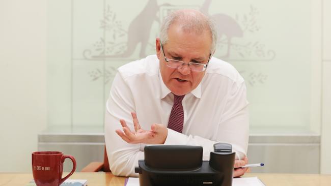 Prime Minister Scott Morrison talks on the phone with President Donald Trump this morning. Picture: Adam Taylor/PMO