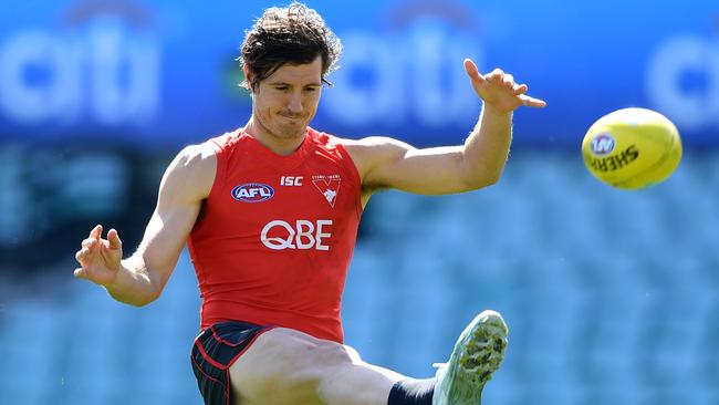 Sydney’s Kurt Tippett gets a kick away at training last week. Picture: AAP