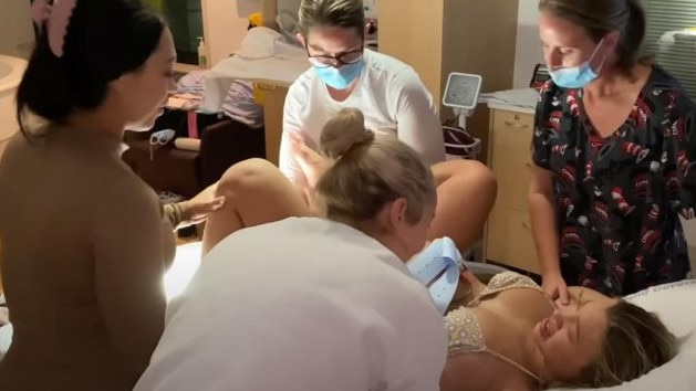 Tammy shared the birth of her baby girl Posy online. Picture: YouTube / Tammy Hembrow