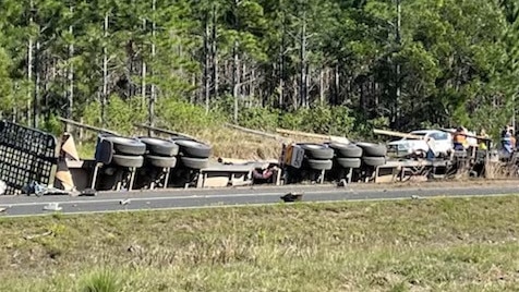 A QFES spokesman said the timber truck was engulfed by fire by the time firefighters arrived at the scene of the crash.