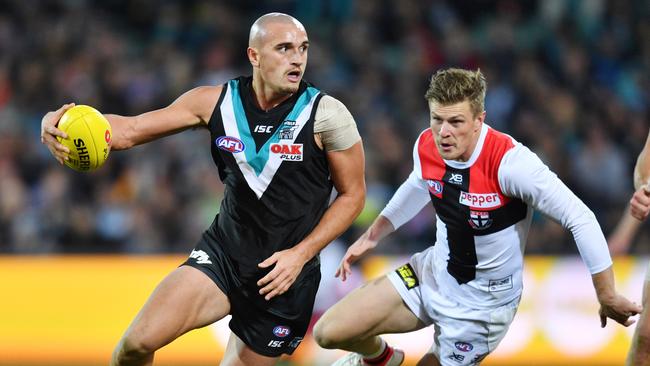 Sam Powell-Pepper of the Power and Jack Newnes of the Saints during the Round 16 AFL match at Adelaide Oval. Picture: AAP Image/David Mariuz