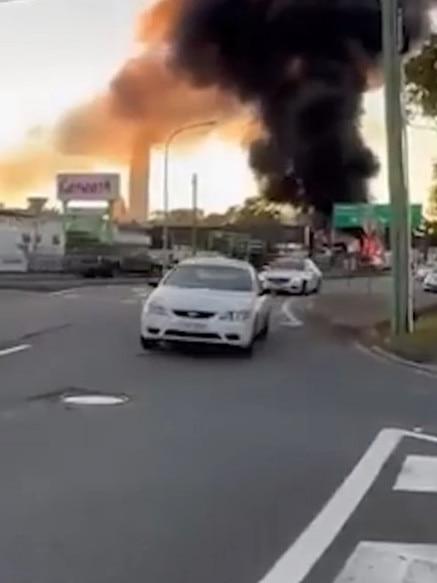 Qld Luxury Car Rentals has been engulfed in flames as police say the fire is being treated as suspicious. Picture: 9News