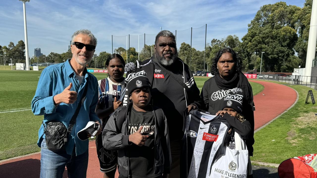 Santo Cilauro and the Williams family at the Collingwood training session.