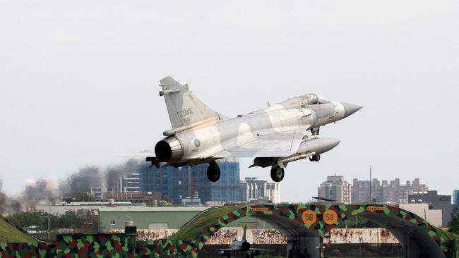 A Taiwanese fighter jet lands at an air force base in Hsinchu, northern Taiwan.