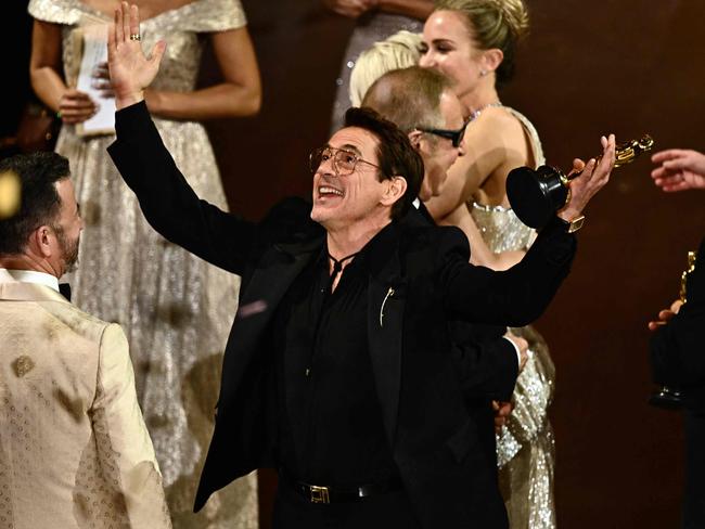 US actor Robert Downey Jr. reacts onstage after "Oppenheimer" won the award for Best Picture. Picture: AFP