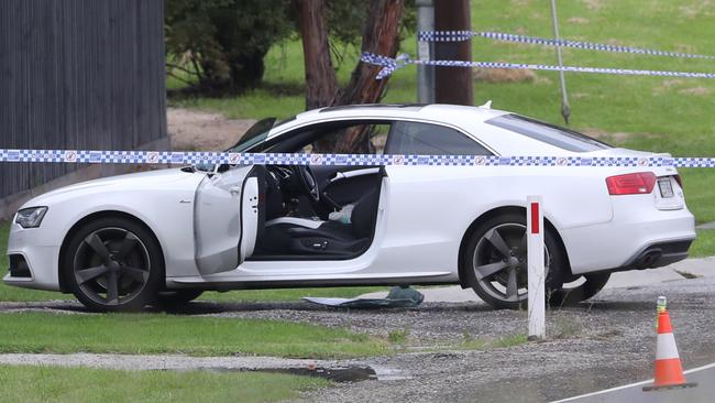 A white Audi remains at the scene of a shooting in Narre Warren South. Picture: David Crosling